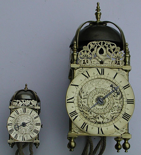 tiny lantern clock alongside normal-sized clock