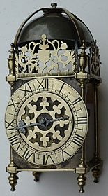 rare Charles I period lantern clock having a fretted centre
