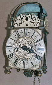 Seventeenth century lantern clock in its original case