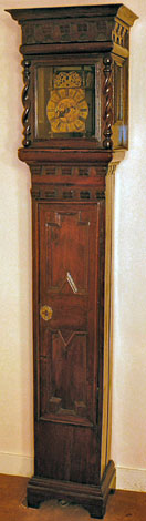 Very rare lantern clock in its original oak case, 1680s, the clock monogrammed 'BH', probably from West Yorkshire