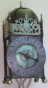 primitive lantern clock with iron frame dating from the early seventeenth century